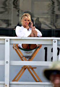 Pamela Anderson under table upskirt
